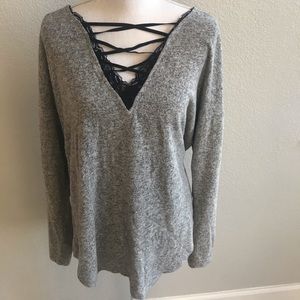 Cute gray sweater with black ribbon details